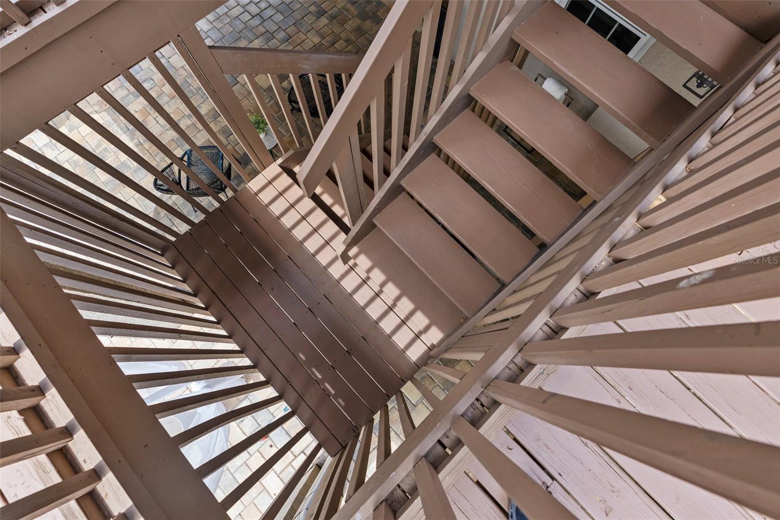 Upstairs deck overlooking pool.