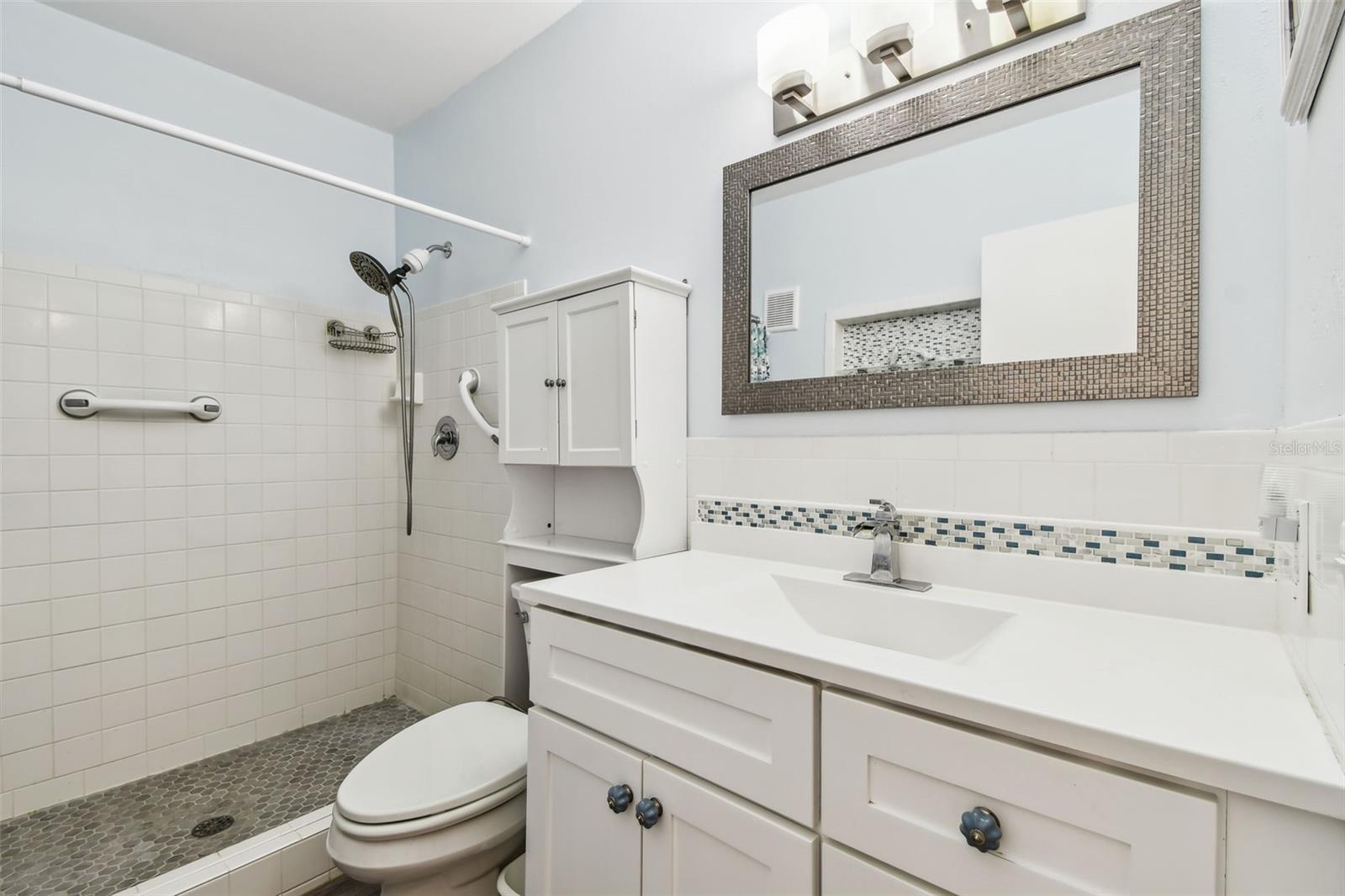 Master bathroom with step-in shower. Nicely remodeled
