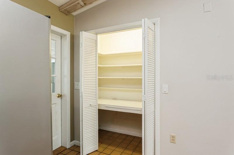 Built in pantry - and garage entrance on left