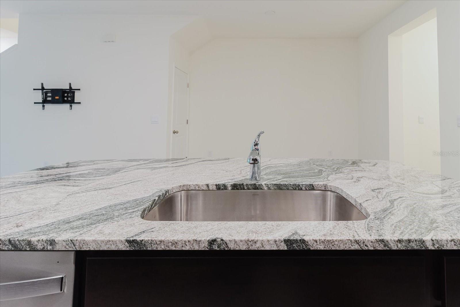 Under-mount sink and granite swirl