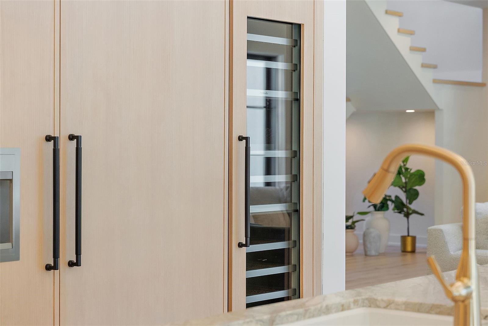 Thermador paneled Appliances with full wine fridge