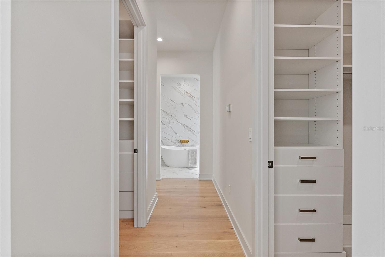 Two Separate Primary Suite Walk-In Closets