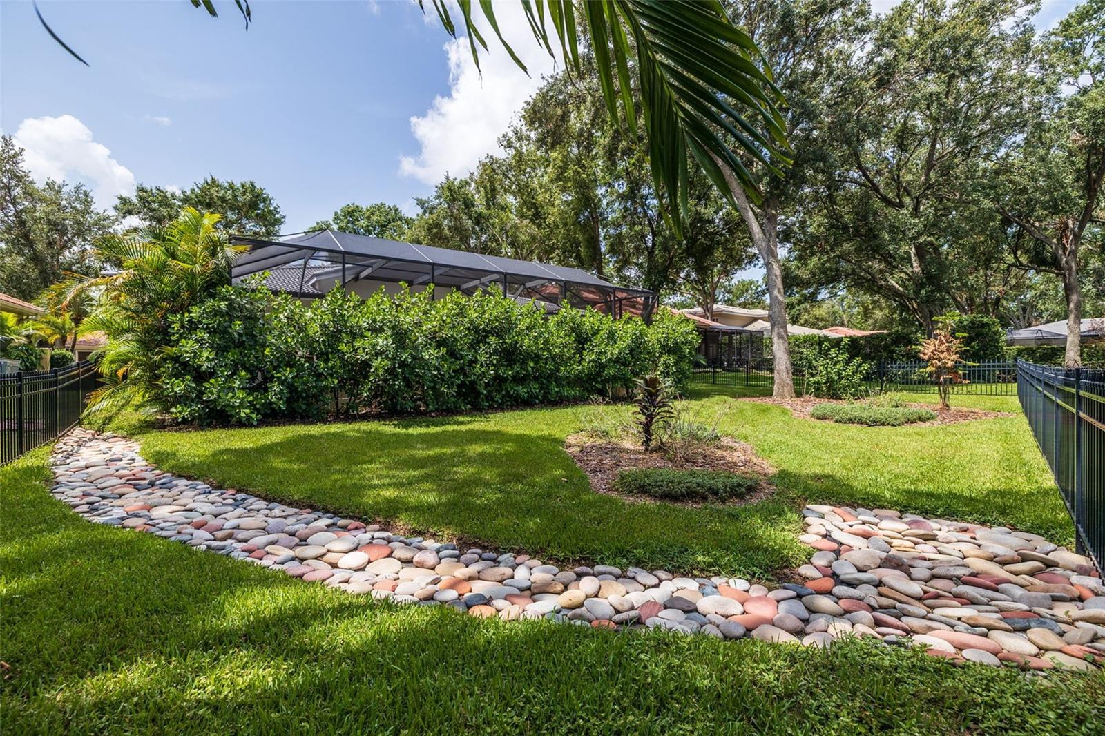 Additional yard space outside the pool area.