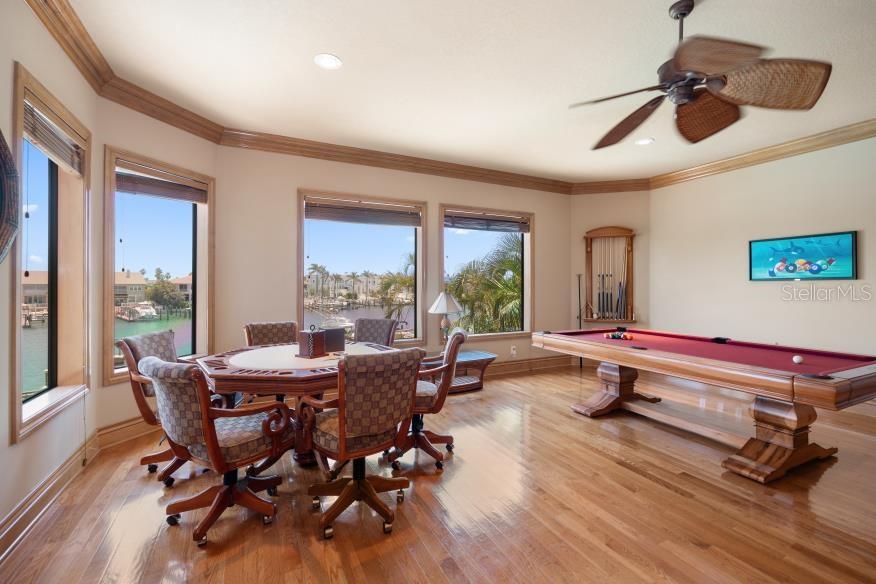 Game Room on 2nd Level overlooking pool area and water