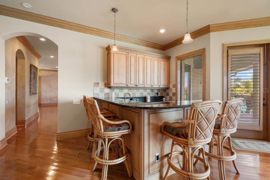 Wet Bar and Seating with Bar Stools