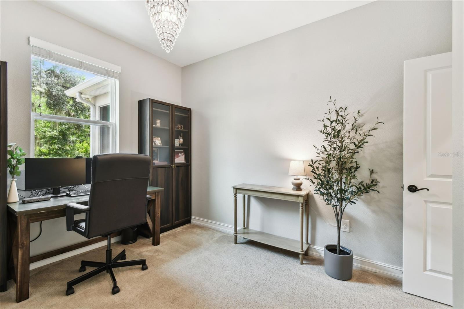 4th Bedroom located on the first floor currently being used as an office.