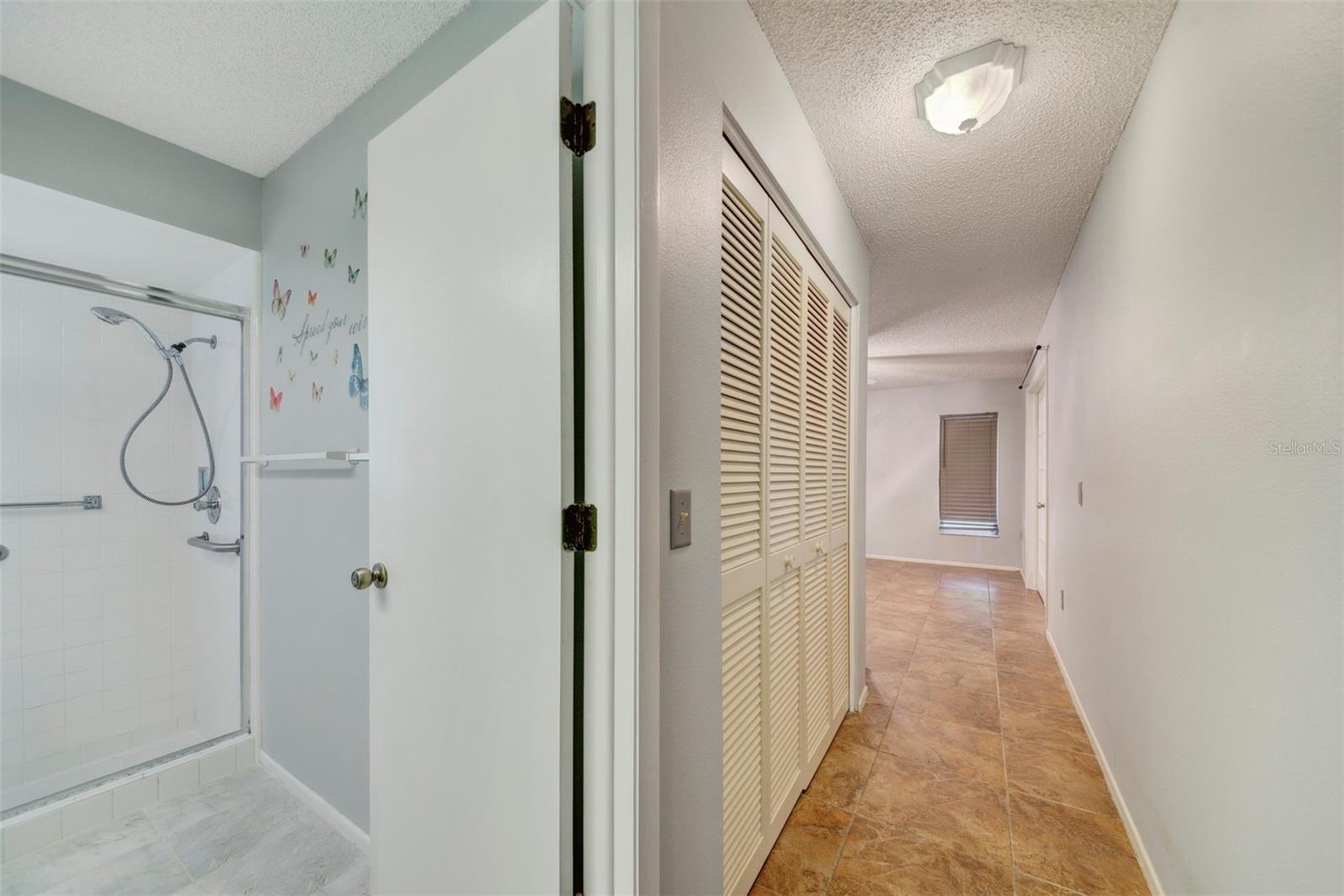 Back bath into hallway closet and back bedroom