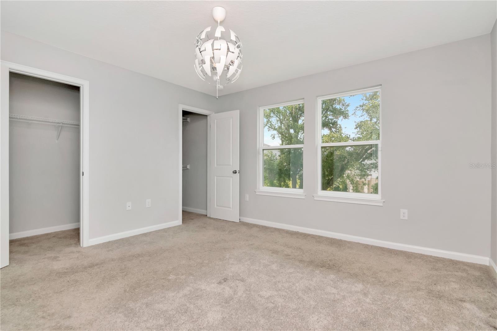 Primary Bedroom with Dual Closets