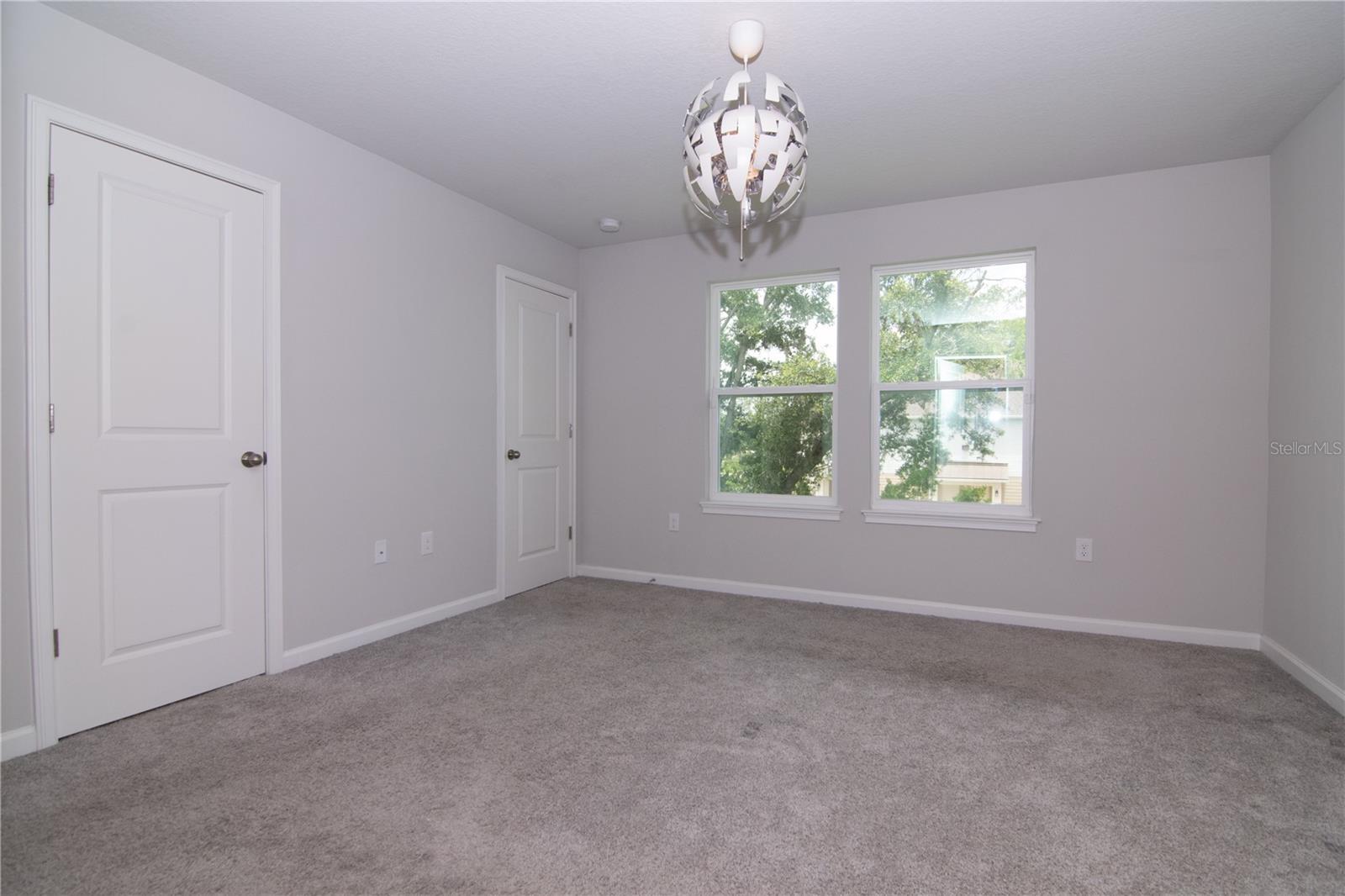 Primary Bedroom with Dual Closets