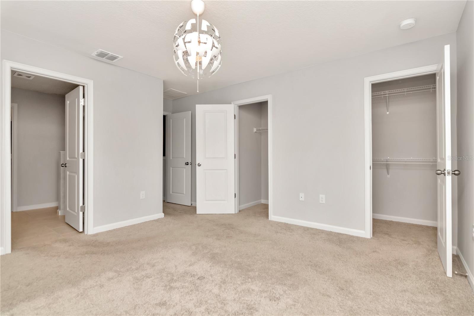 Primary Bedroom with Dual Closets