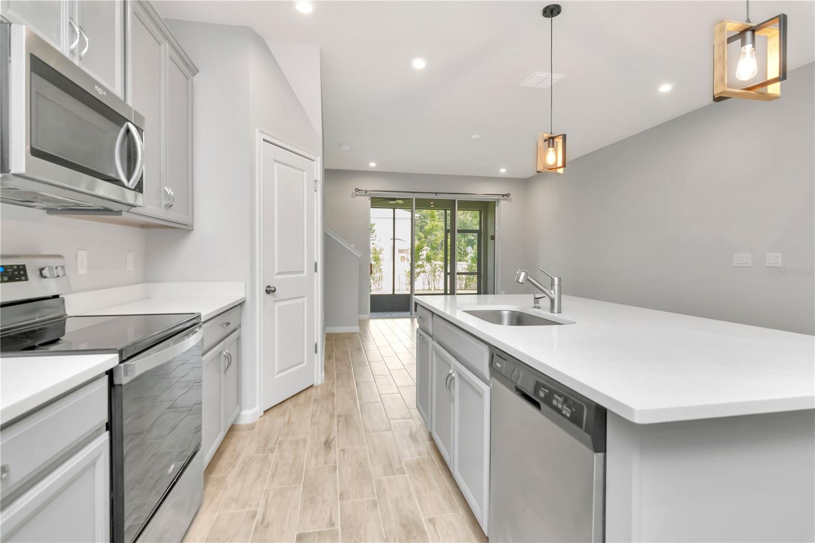 Kitchen with Large Island and Stainless Steel Appliances
