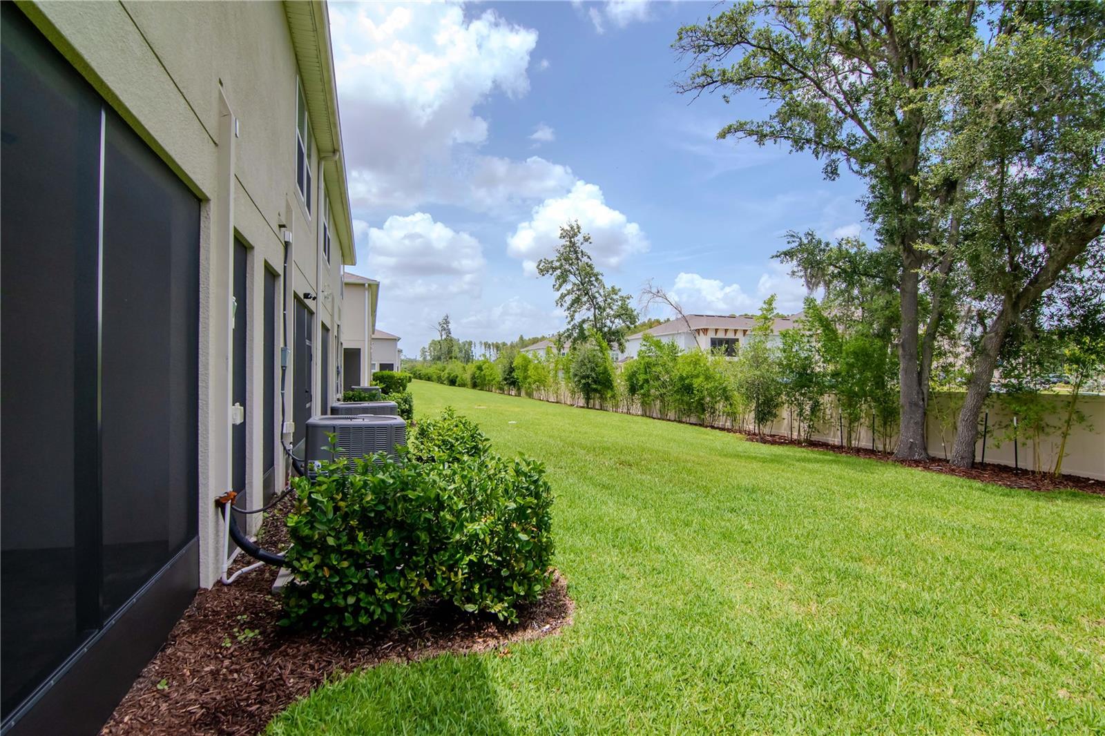 Green Space - Screened In Patio with Pavers