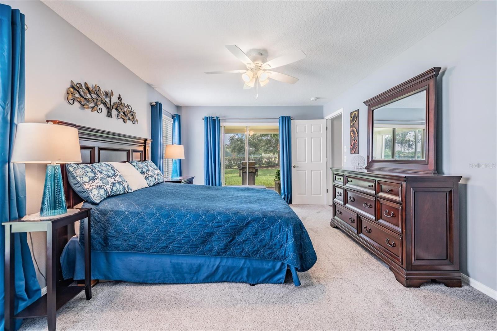 Sliding glass door leads to screened in lanai