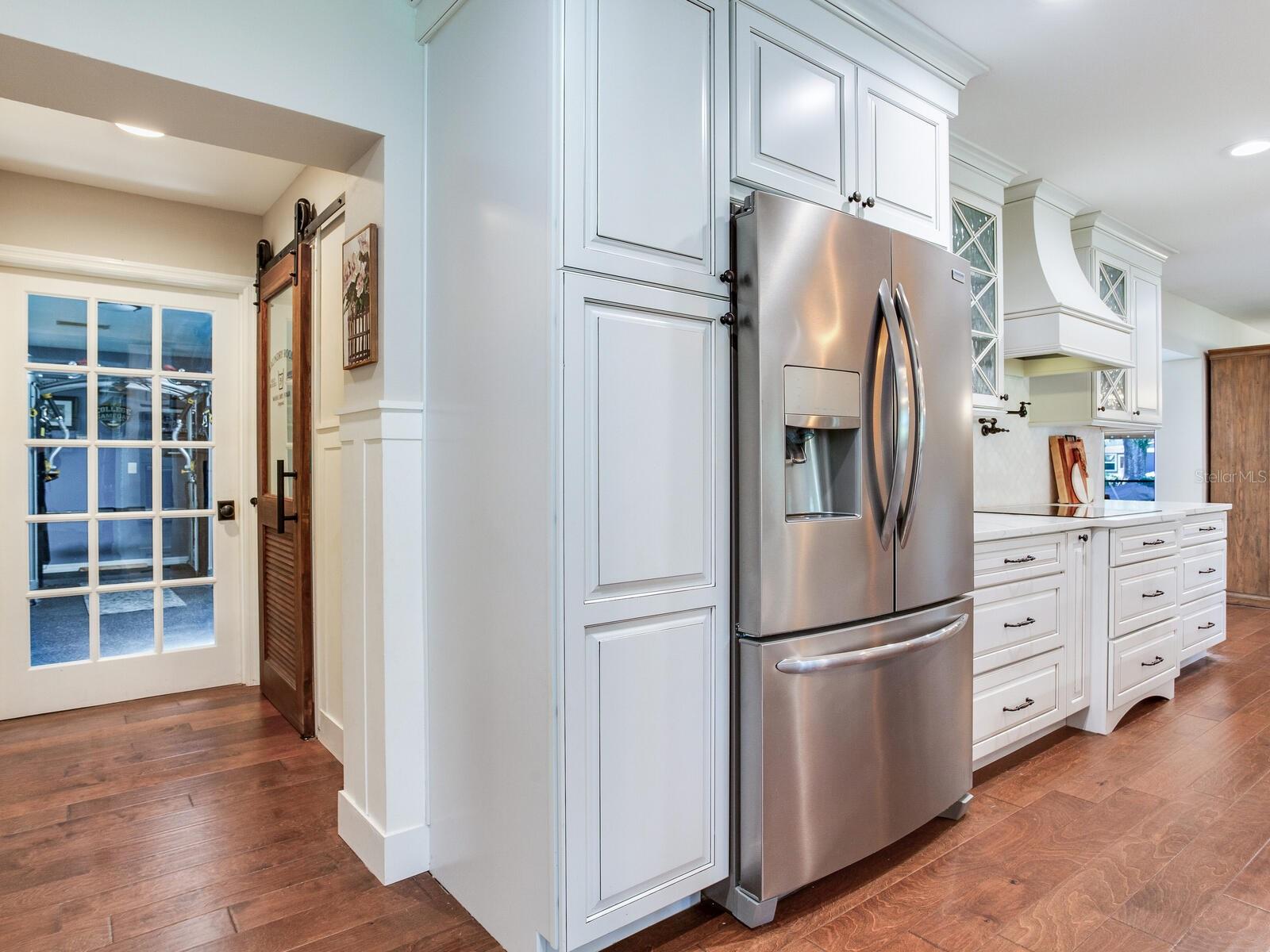 Gym Door (left), Laundry Door (left), Kitchen (right)