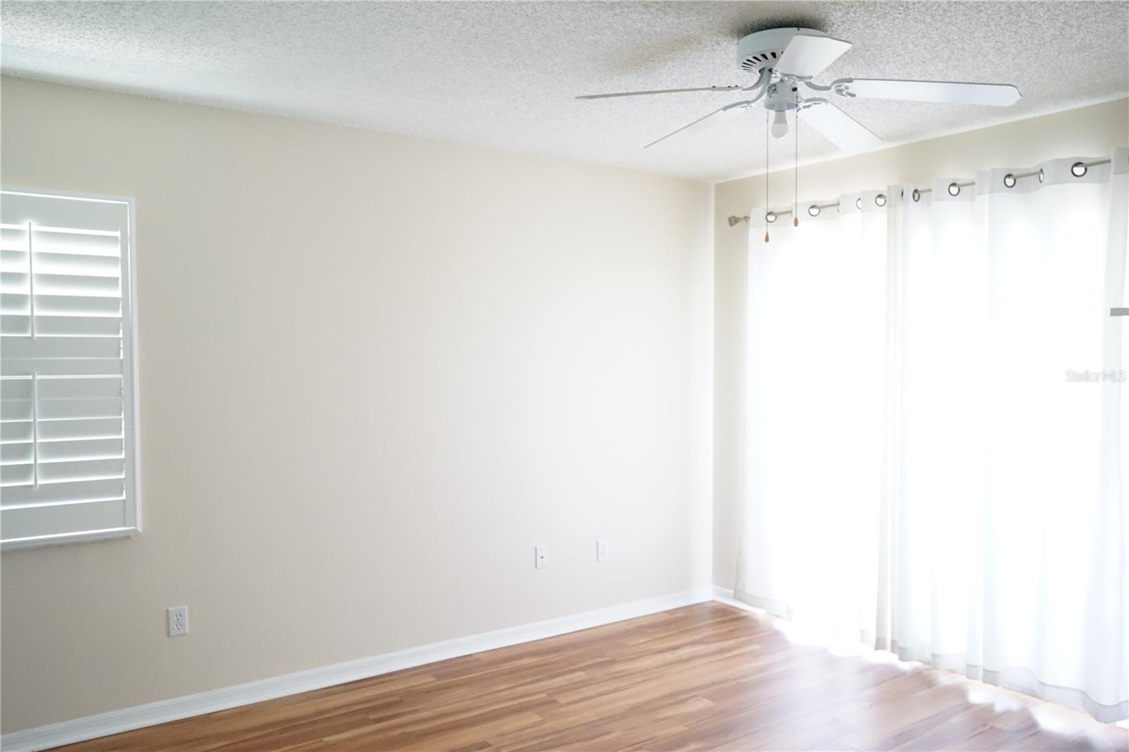 primary bedroom has a slider to the lanai