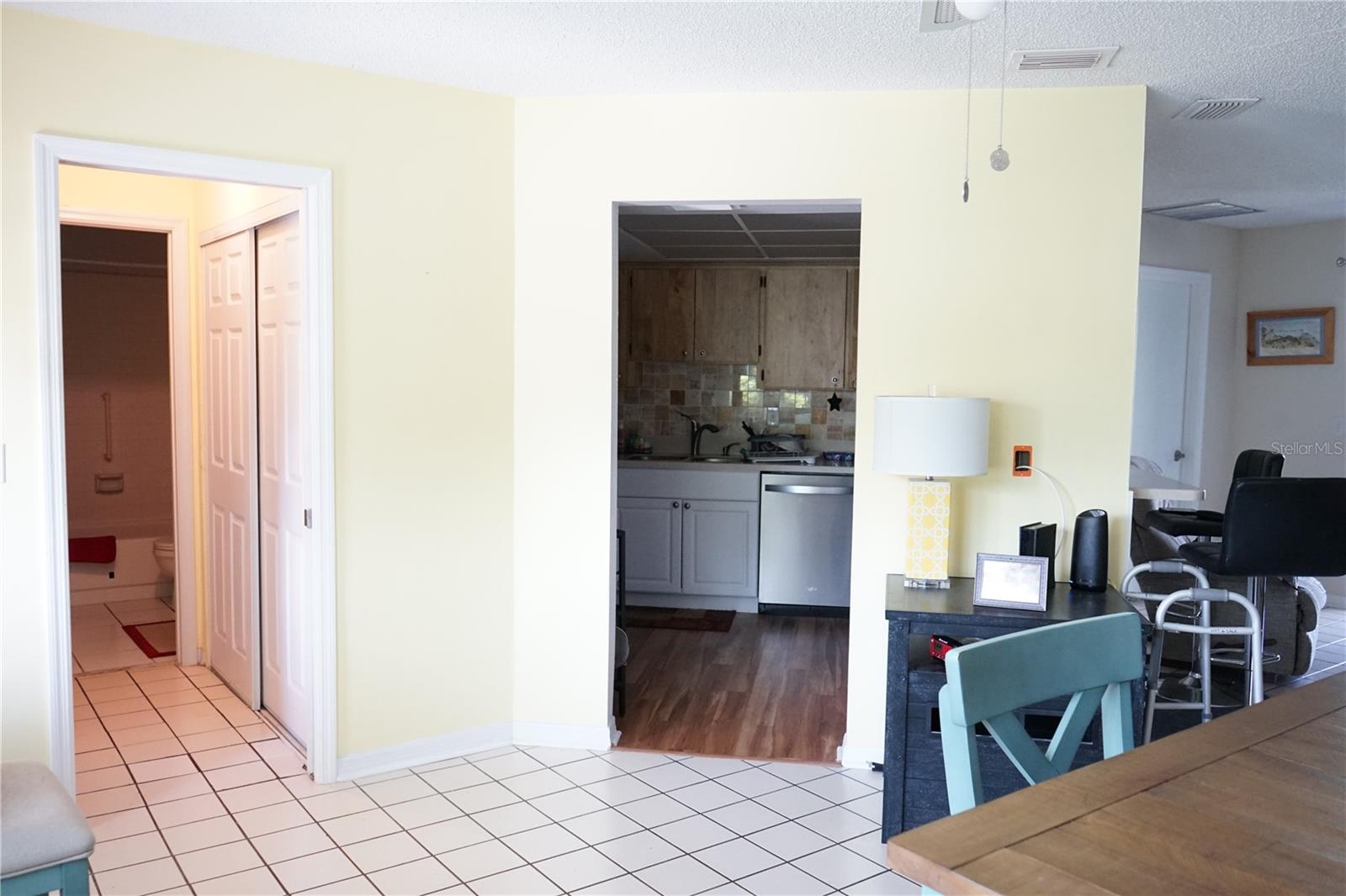 view from dining area o kitchen and guest area