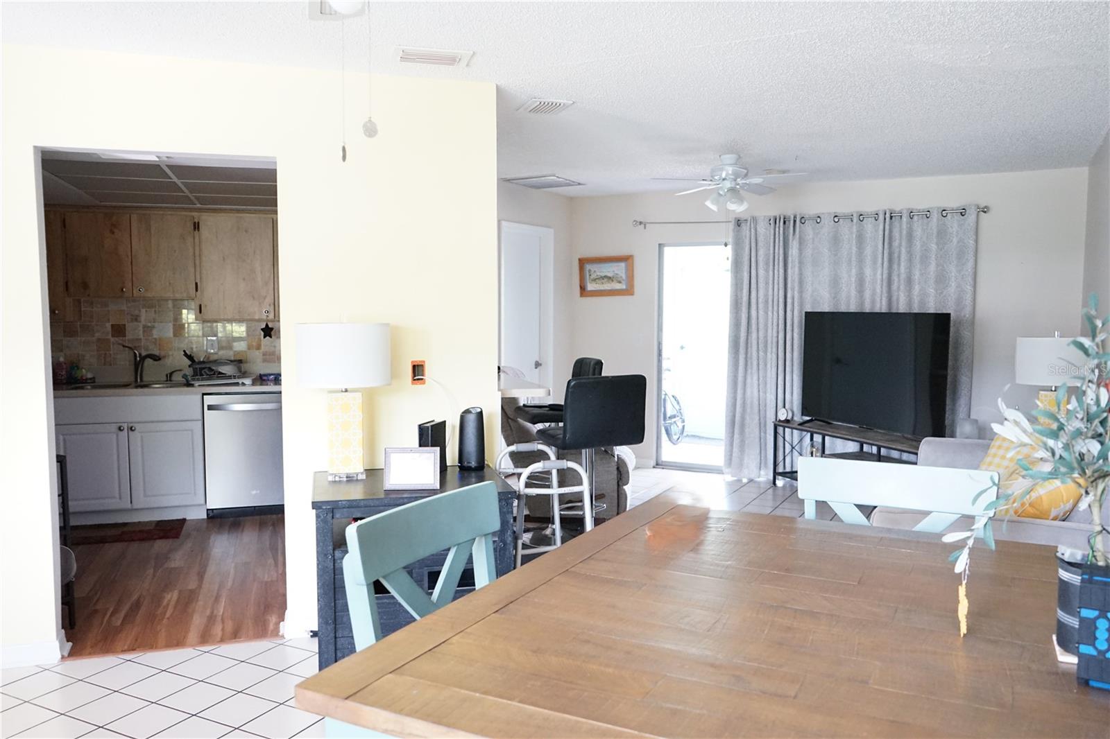 enter into dining space with kicthen and living room here also