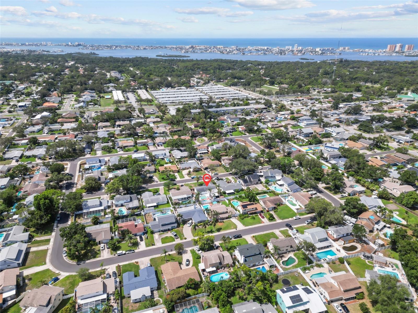 Aerial View of Neighborhood with View of Gulf & Barrier Islands
