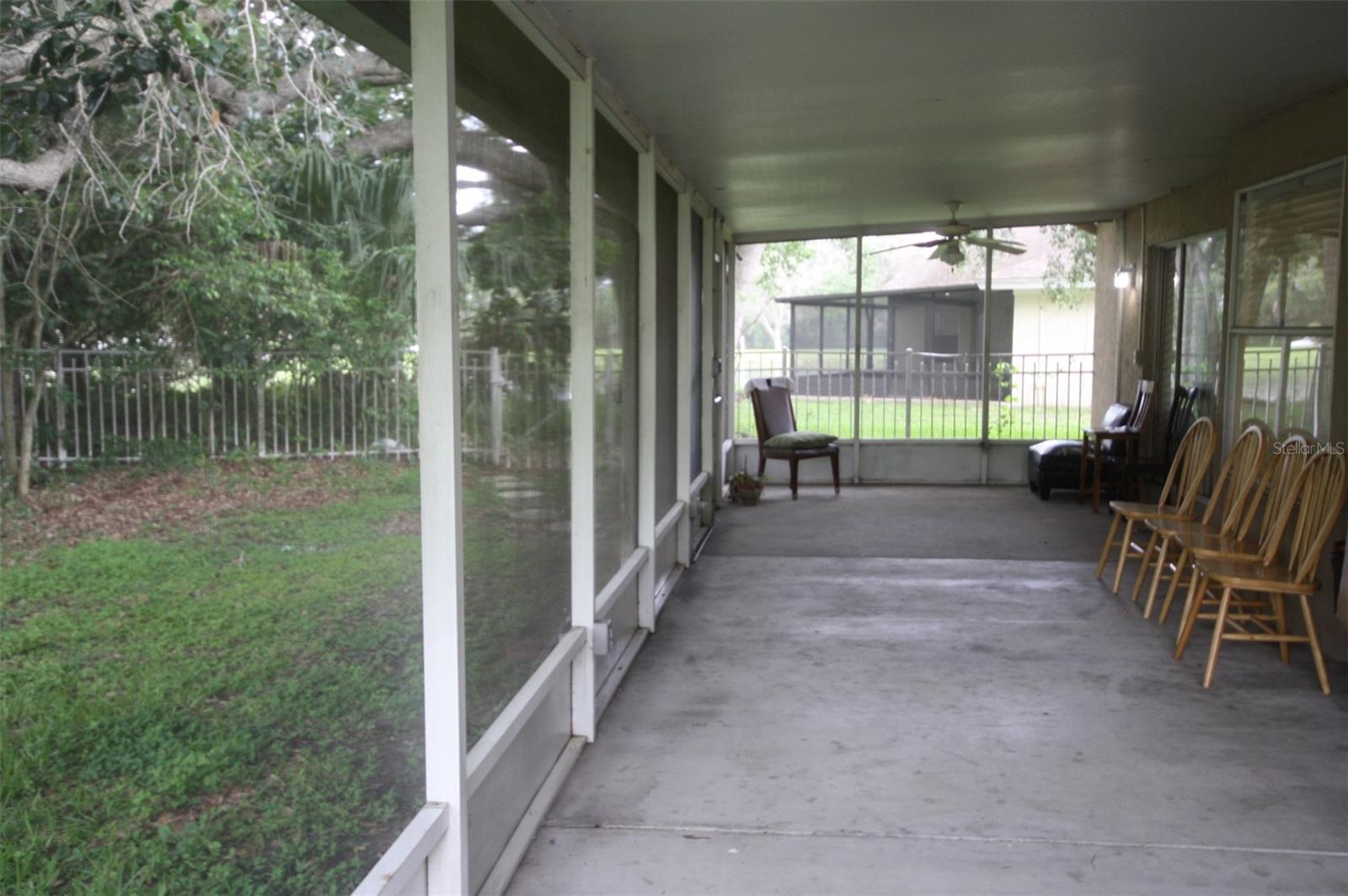 Enclosed backyard patio area.