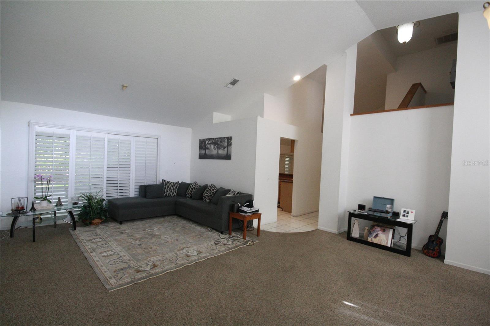 Kitchen with vaulted ceilings.