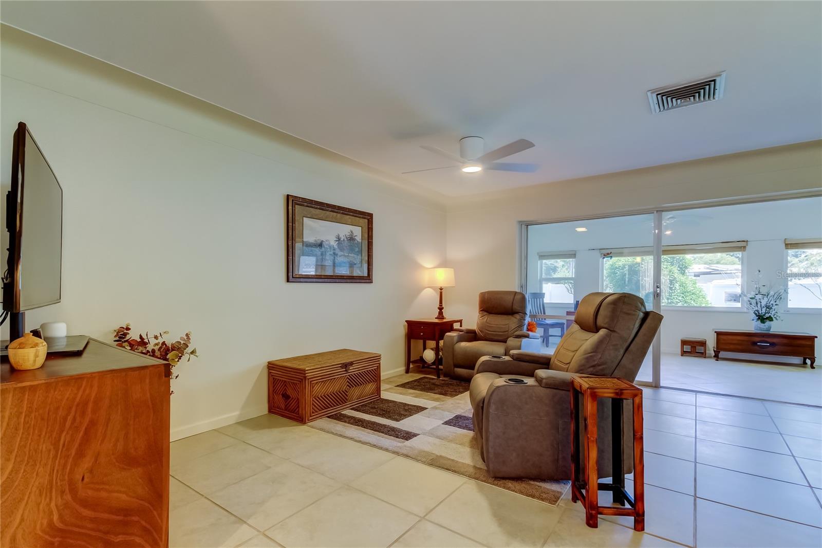 Living room opens to family room