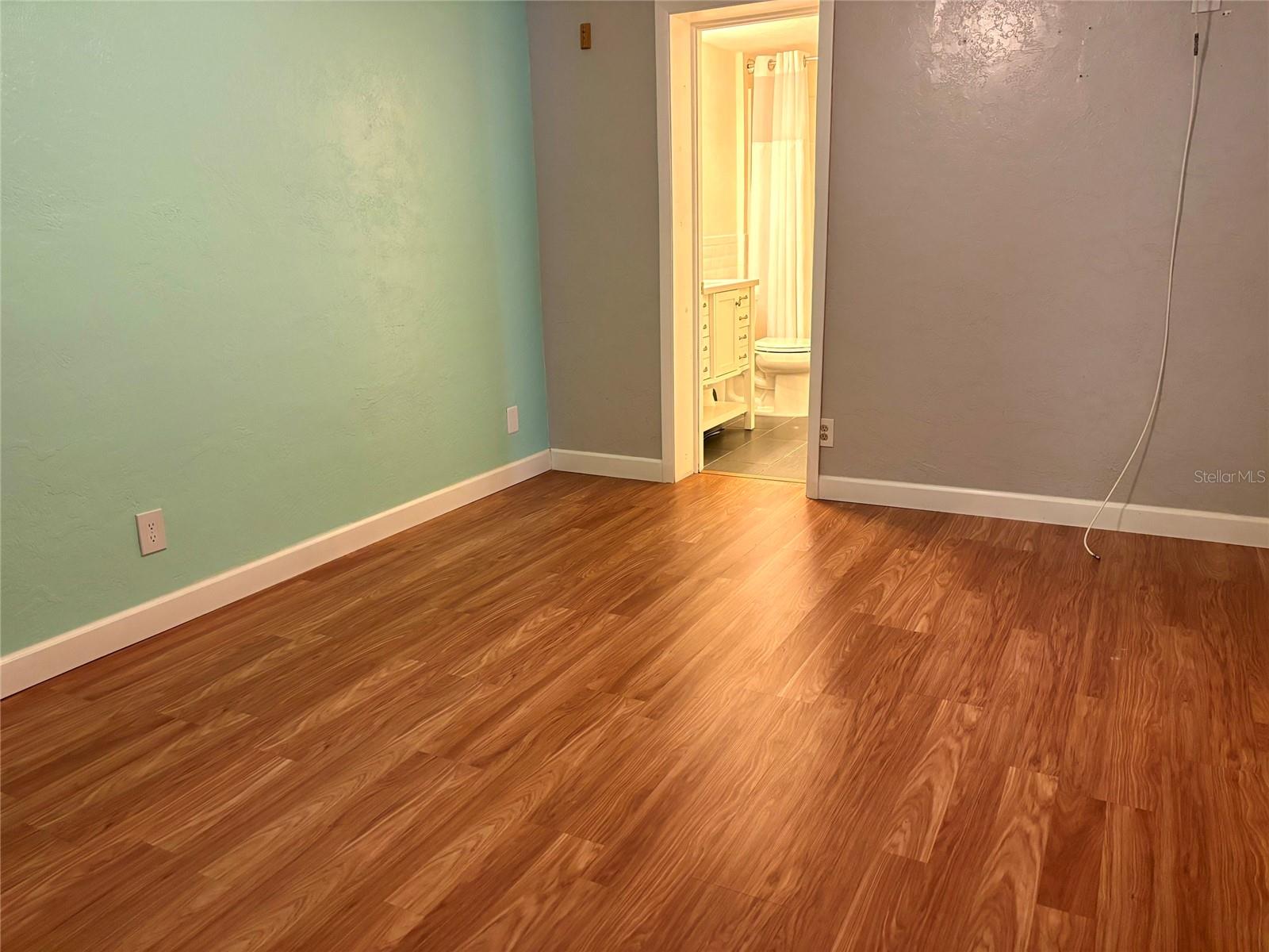 Primary bedroom with ensuite bathroom