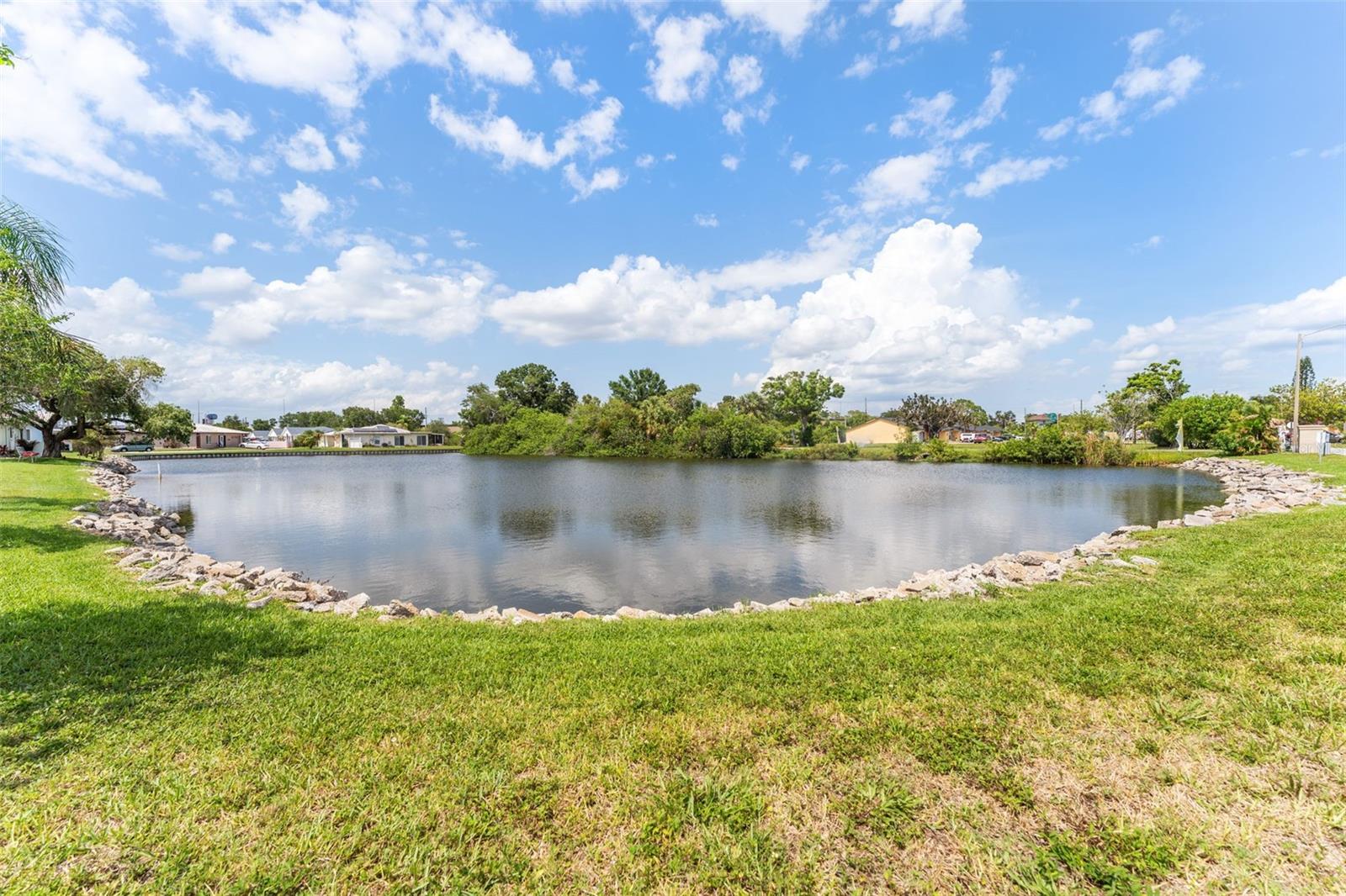 view of lake from the side home patio