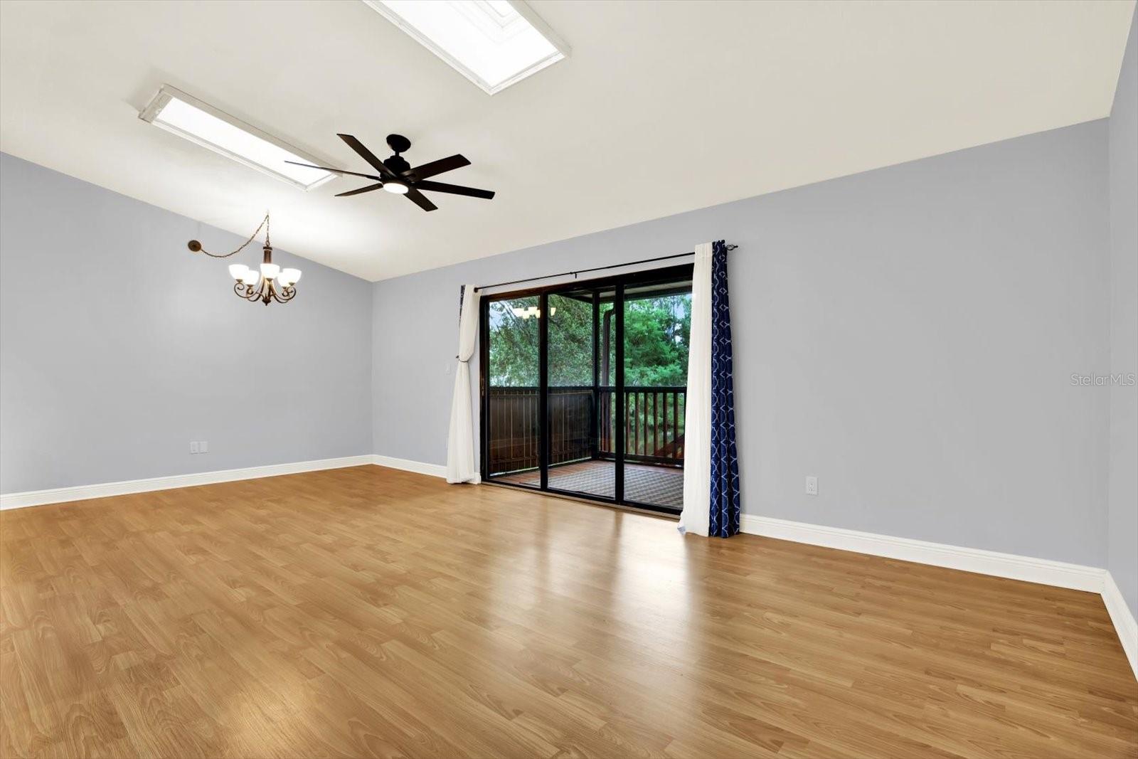 Living -Dining and walk out to your screened enclosed Back Porch