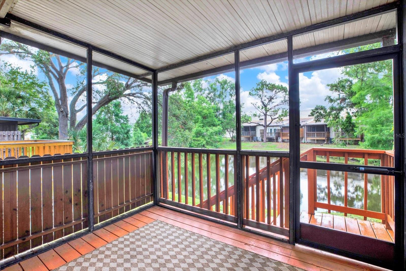 Back Porch with private stairs heading down to the water