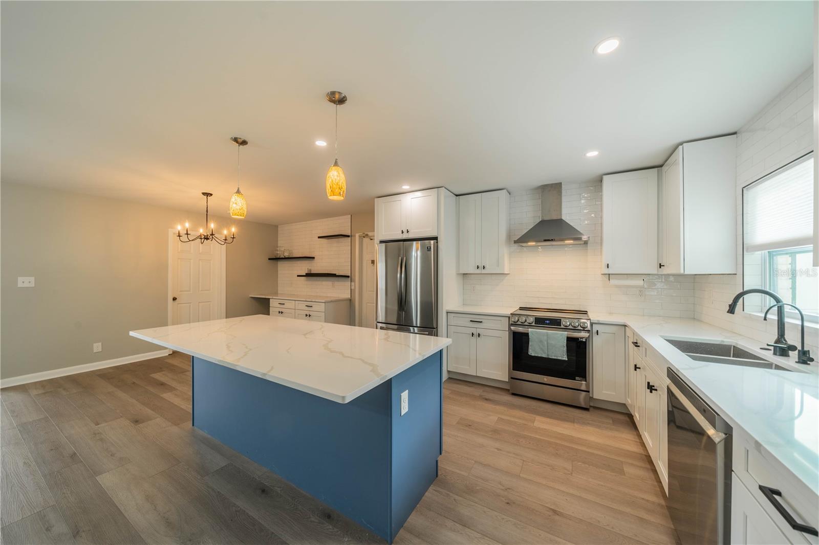 Open kitchen area with dining area