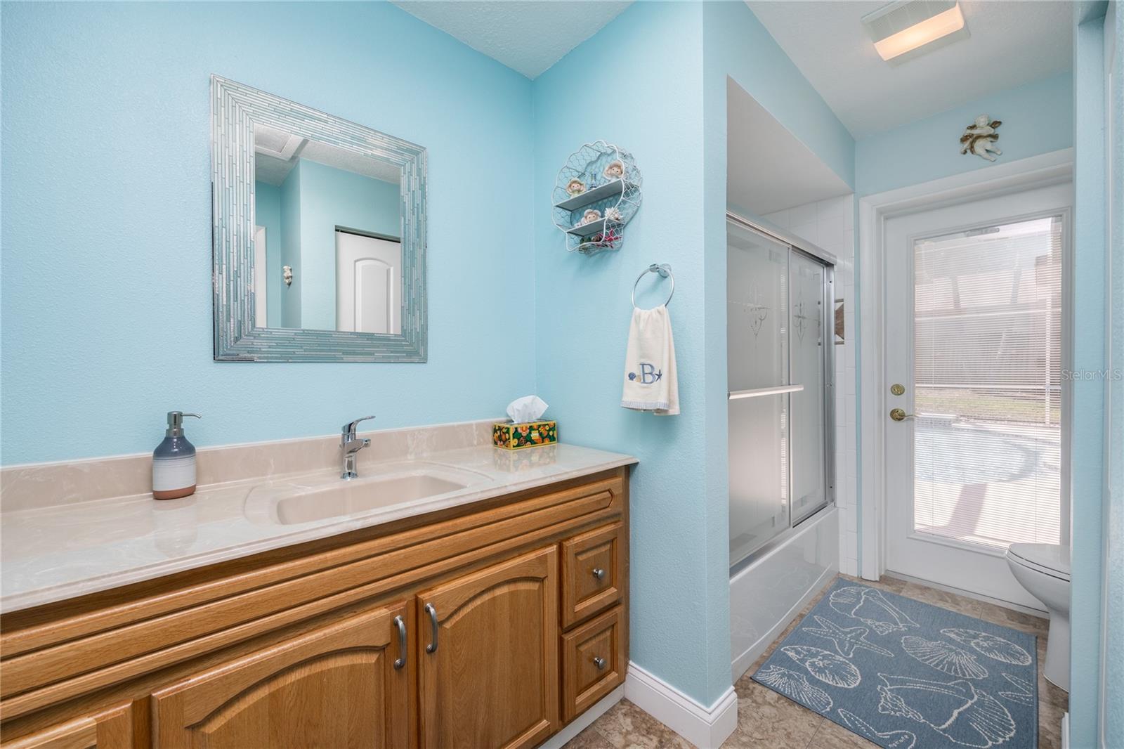 Main Bathroom with Pool access! Remodeled!