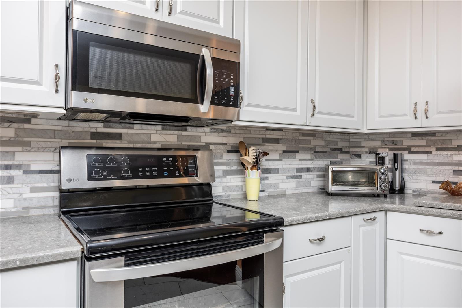 Full Backsplash Accent with updated cabinets