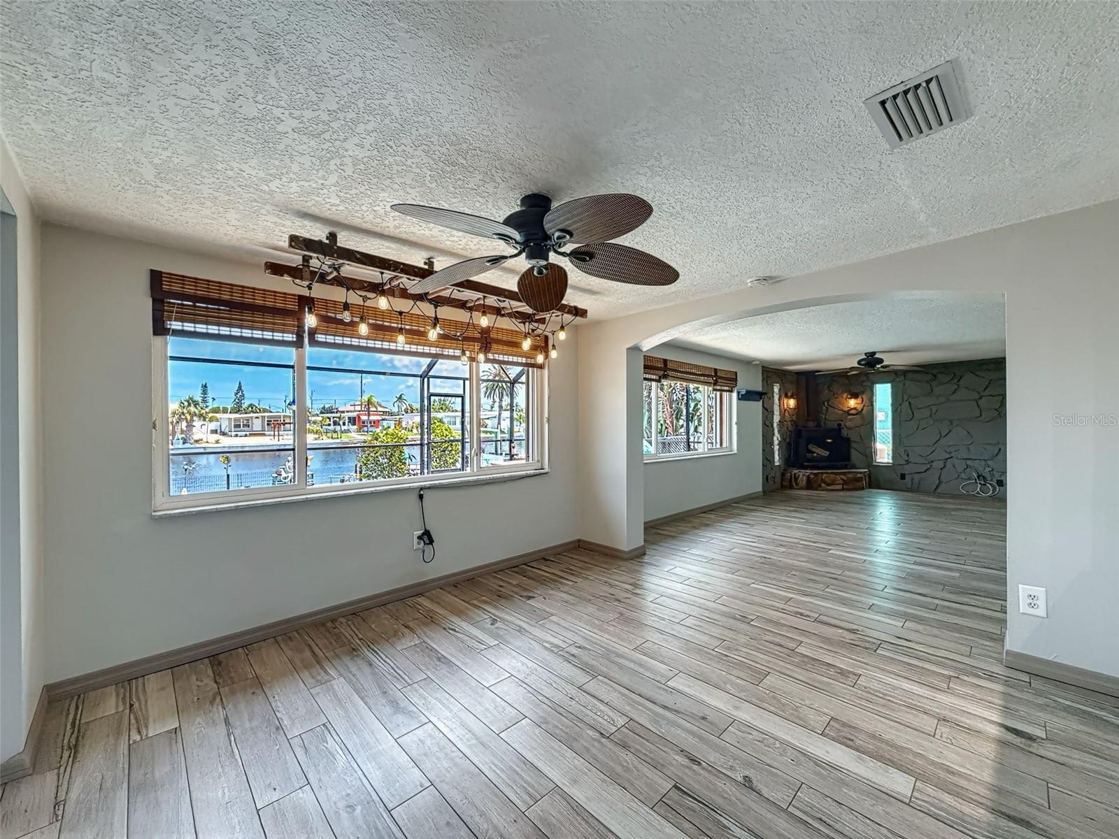 DINING ROOM WITH A COOL LIGHT FIXTURE