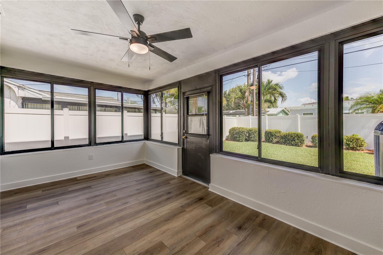 3rd "bedroom" best suited as a bonus room. Off the back of the house with access to backyard.