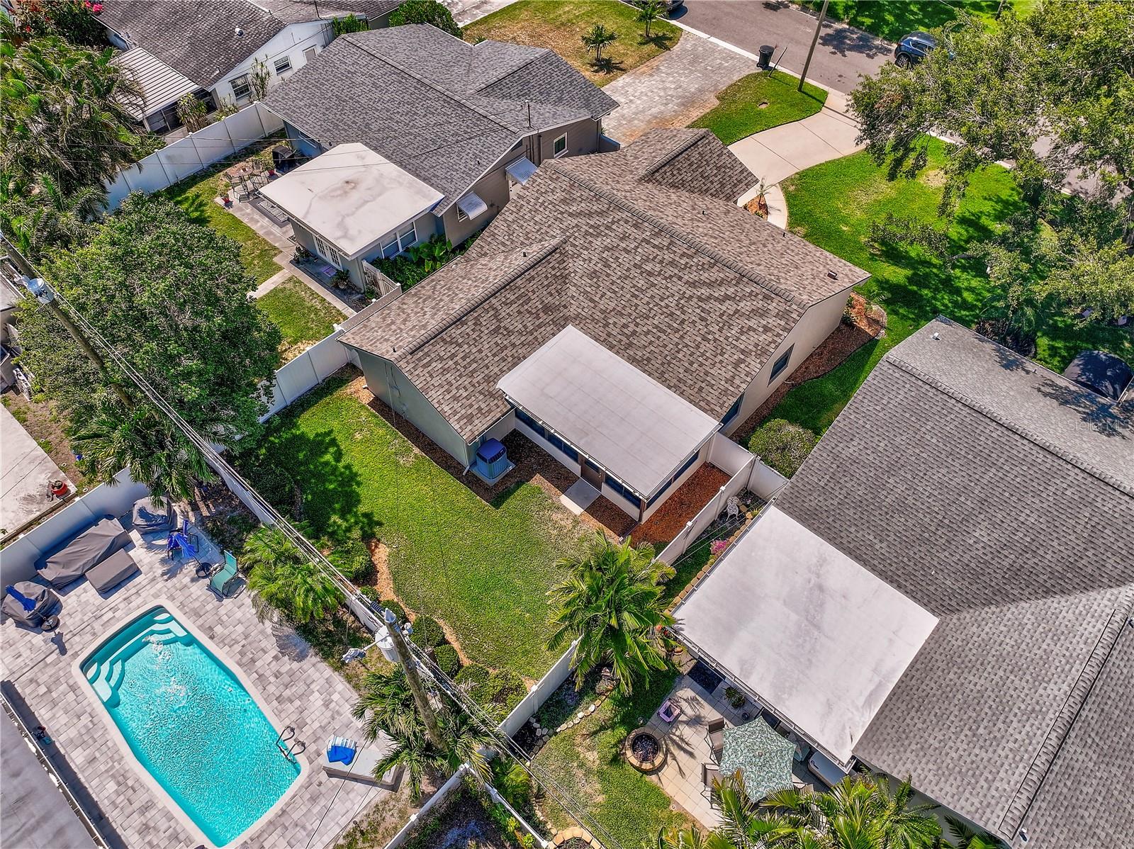 Aerial of back yard. The pool shown is the rear neighbors pool.