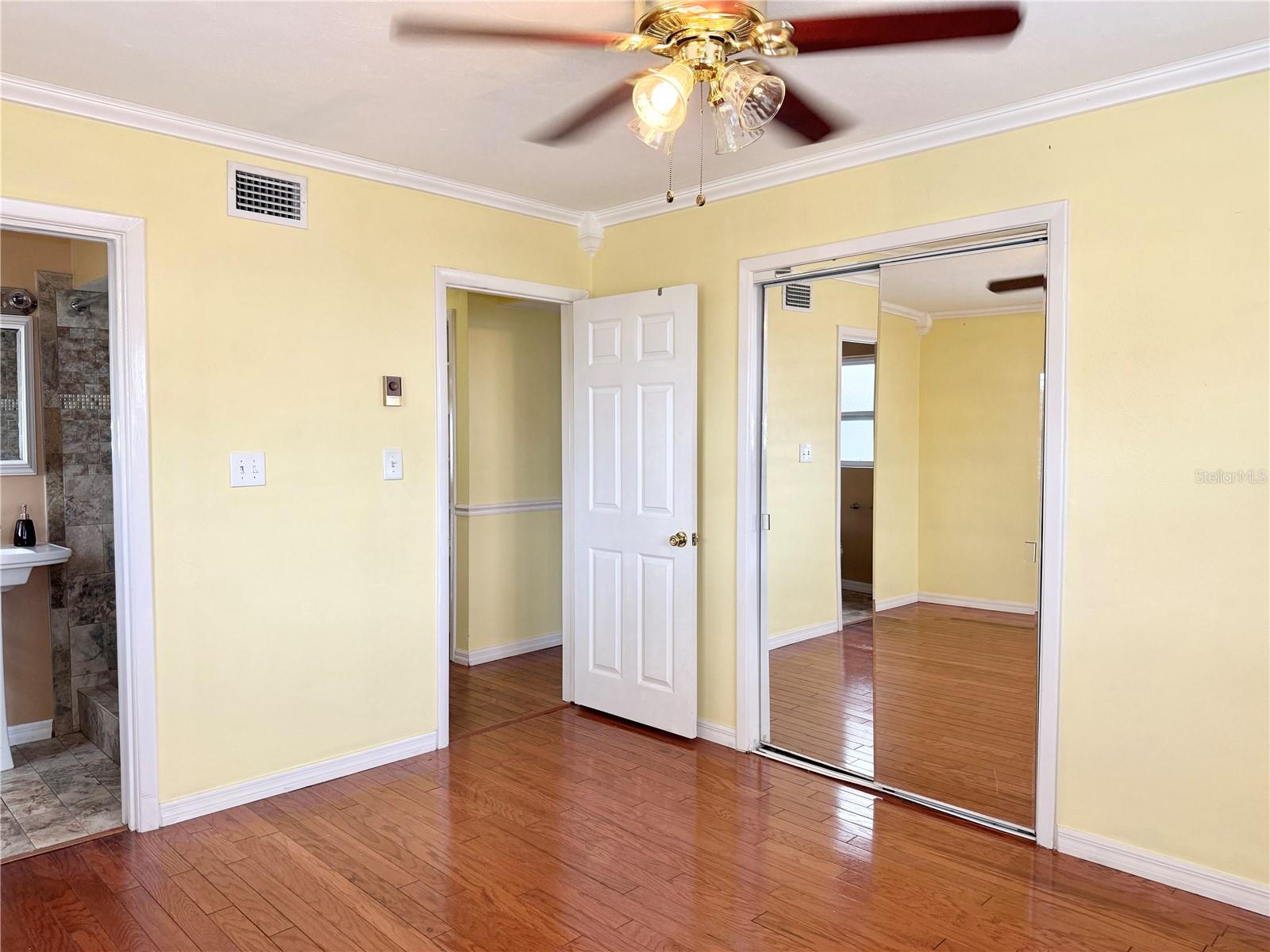 Primary Bedroom - Wood Floors and Ceiling Fan
