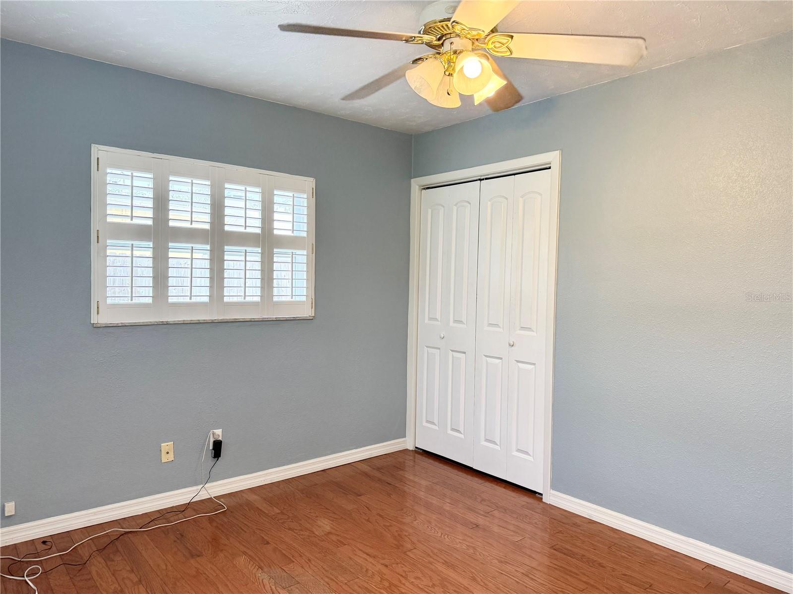 2nd Bedroom - Wood Floors and Ceiling Fan