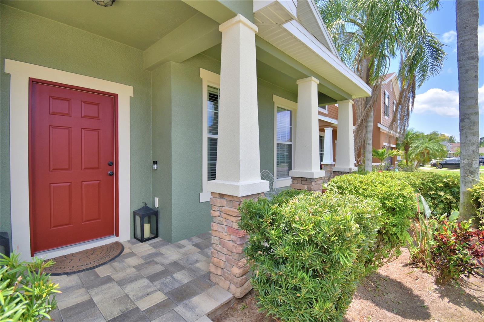 Covered front porch with pavers