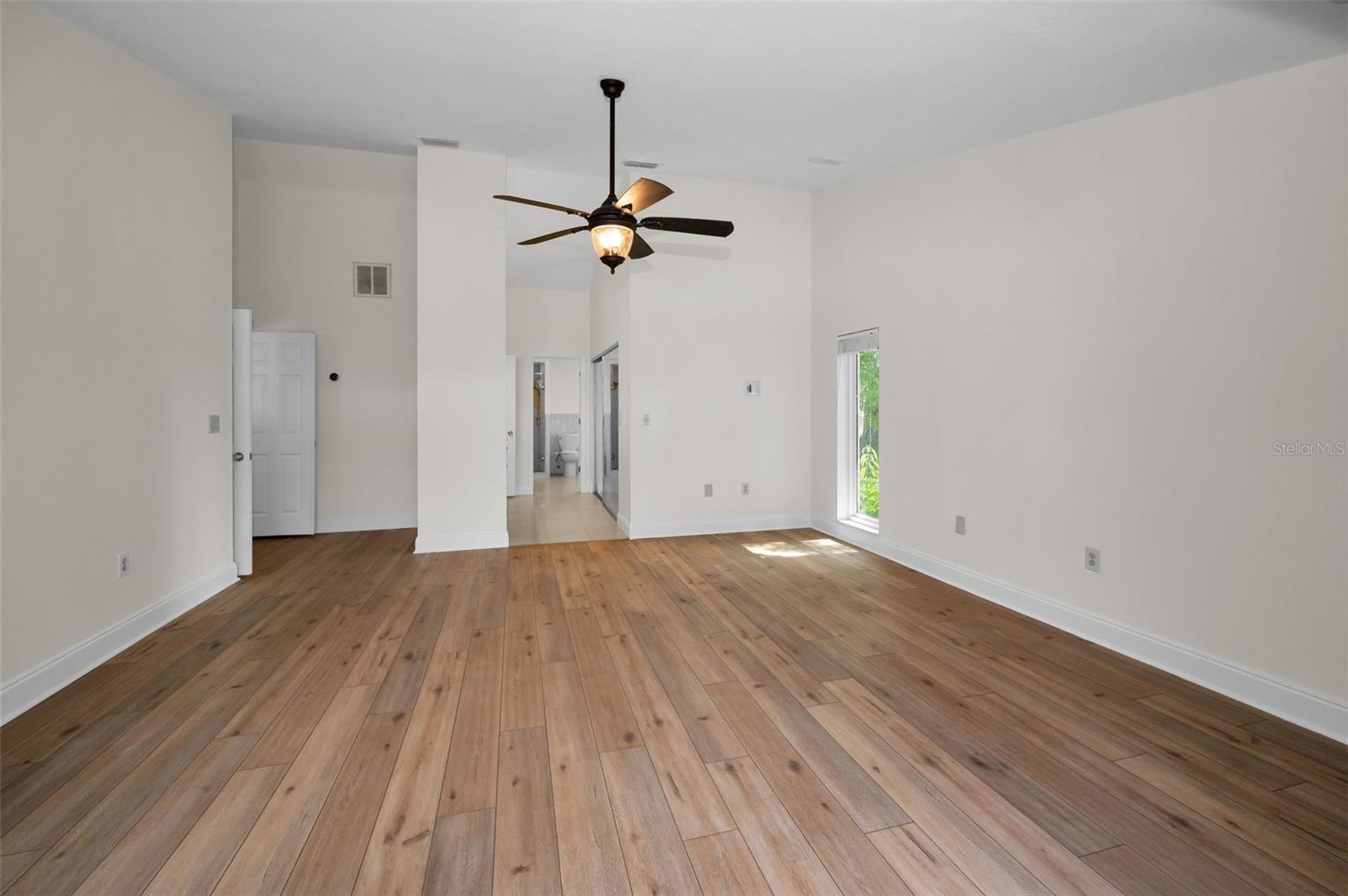 Primary Bedroom w/ Volume Ceiling!