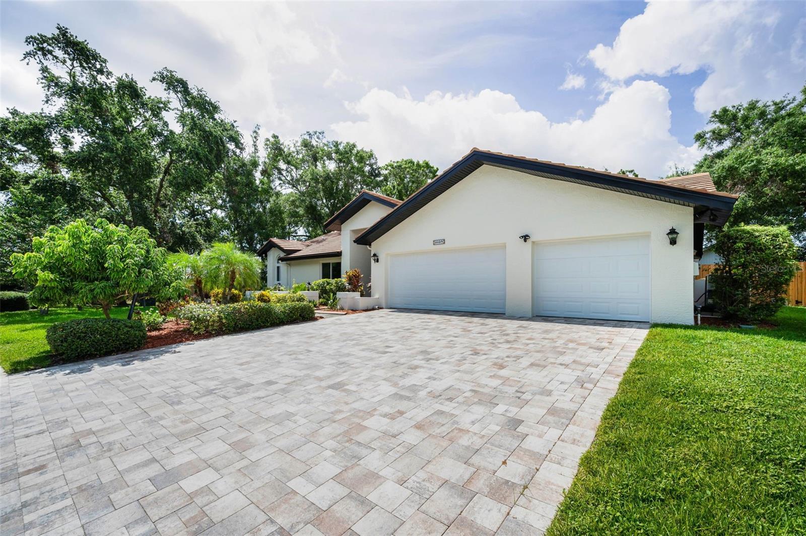 Three Car Garage w/ Pavered Driveway!
