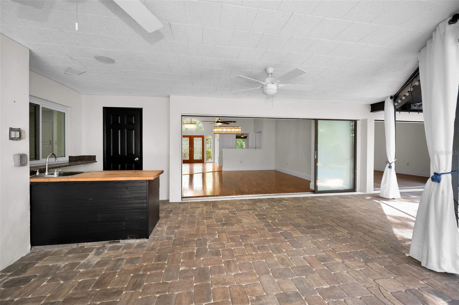 Pavered Lanai Adjacent to Living Room!