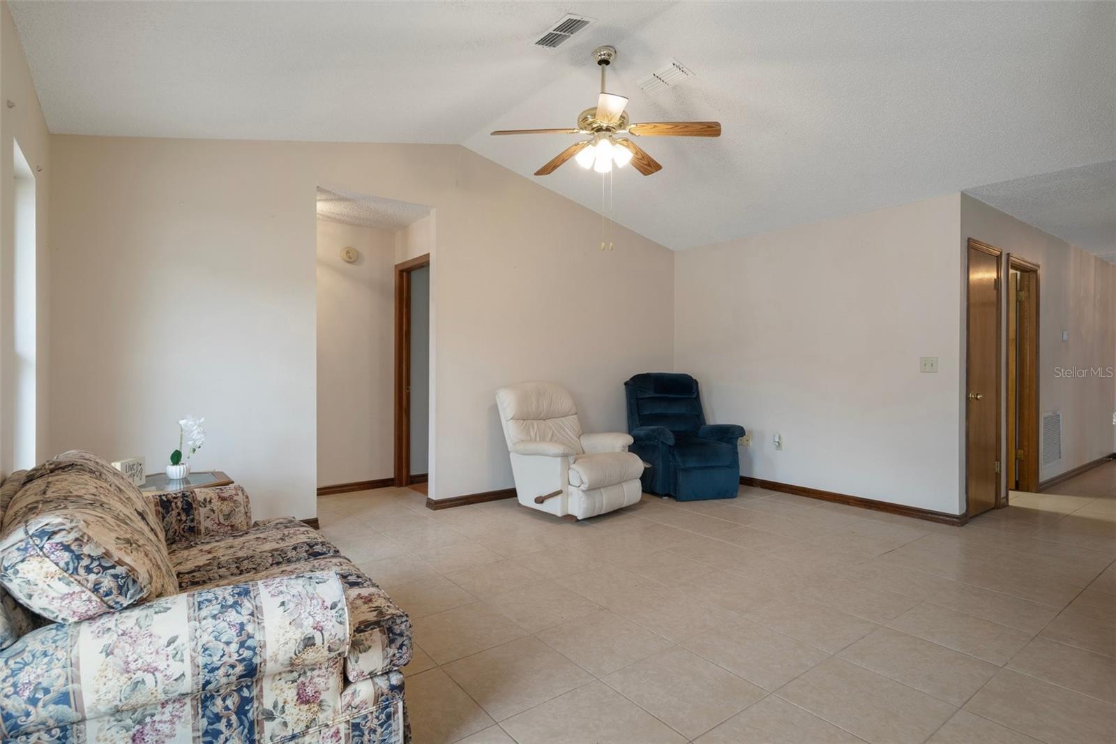 The family room has gorgeous tile floors