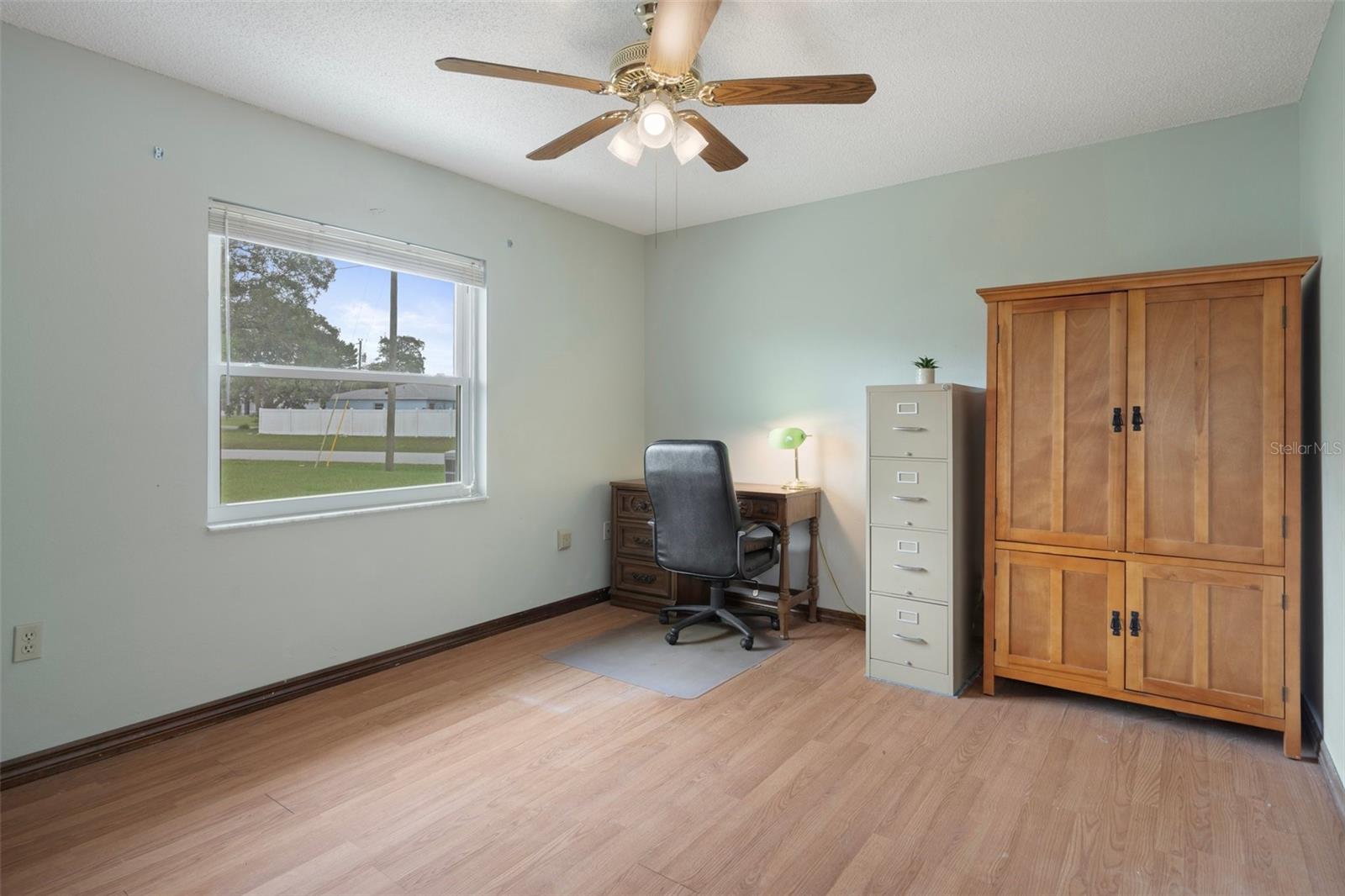 Guest Bedroom with lovely laminate flooring