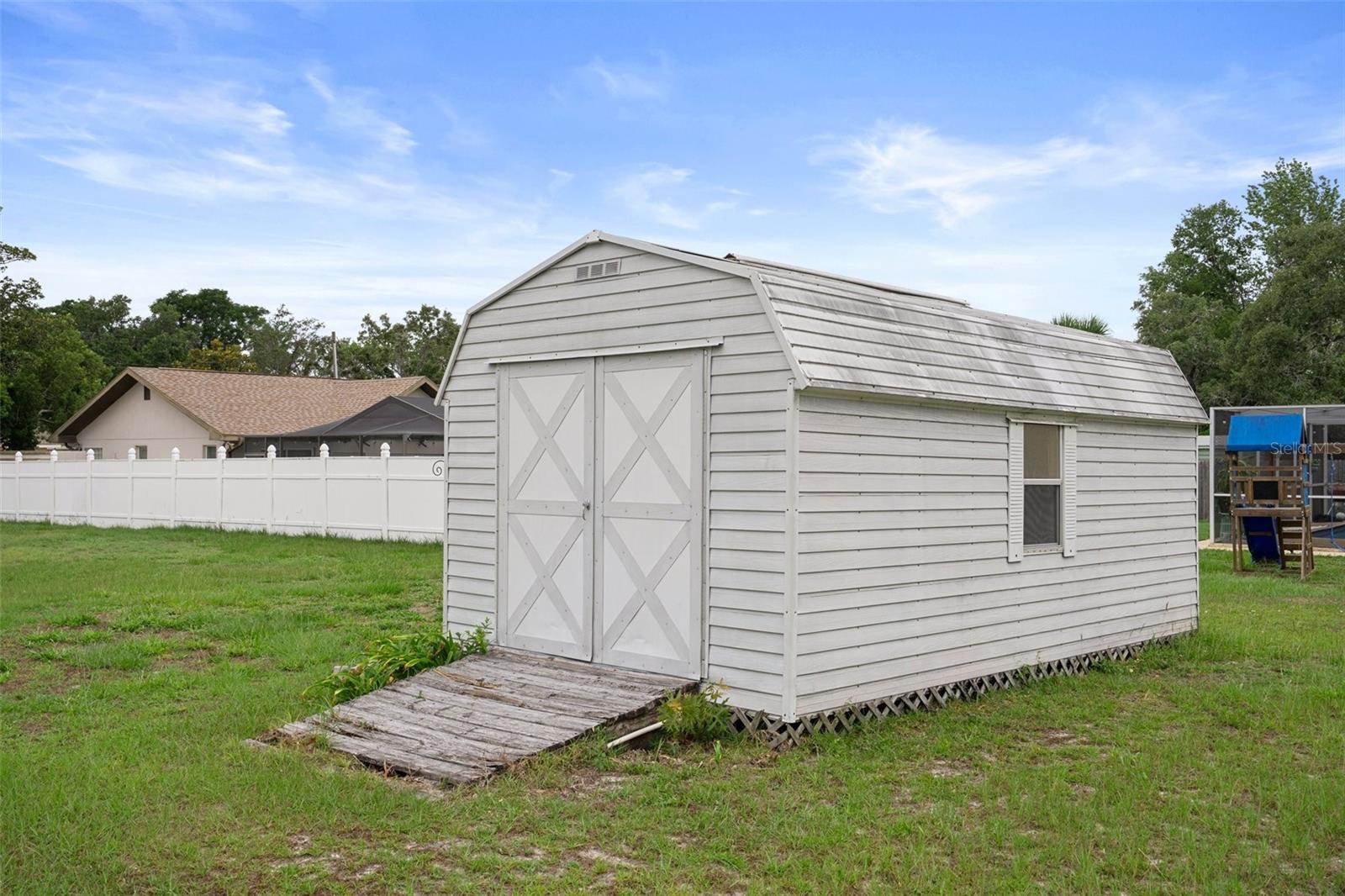 Huge Shed with electricity provides additional storage