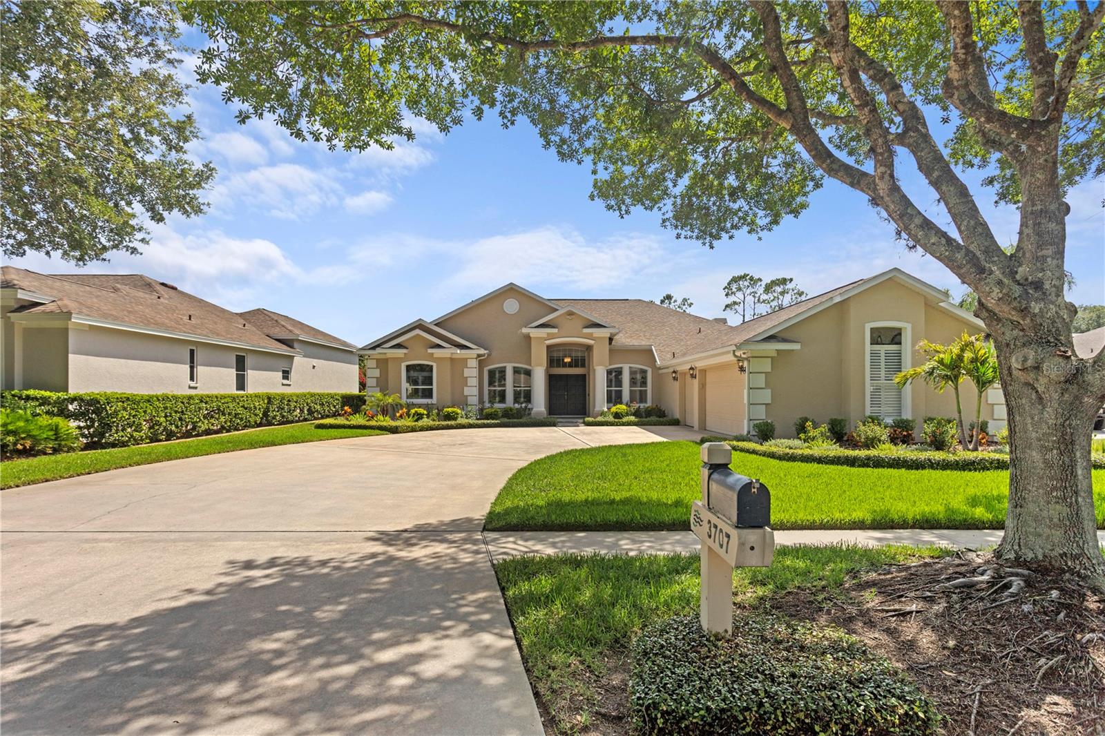 Enjoy picture-perfect curb appeal and a welcoming neighborhood vibe - from the charming mailbox to the sidewalk-lined, shaded streets of the River Hills community.