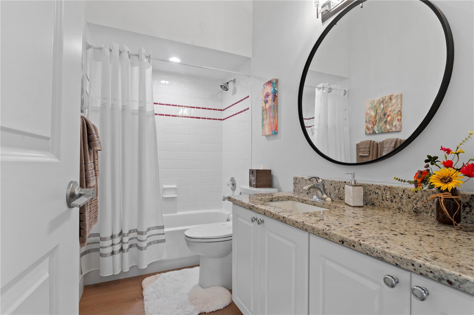 This beautifully finished hall bathroom is easily accessible from both the main living space and nearby bedroom.