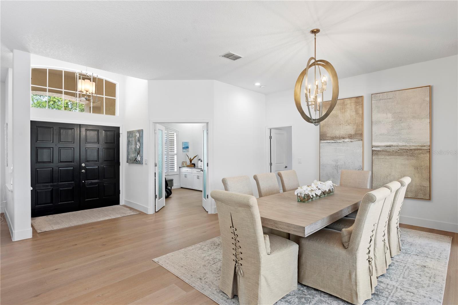 Step inside through double entry doors and take in the beautifully updated interior - a warm welcome into a thoughtfully designed home.