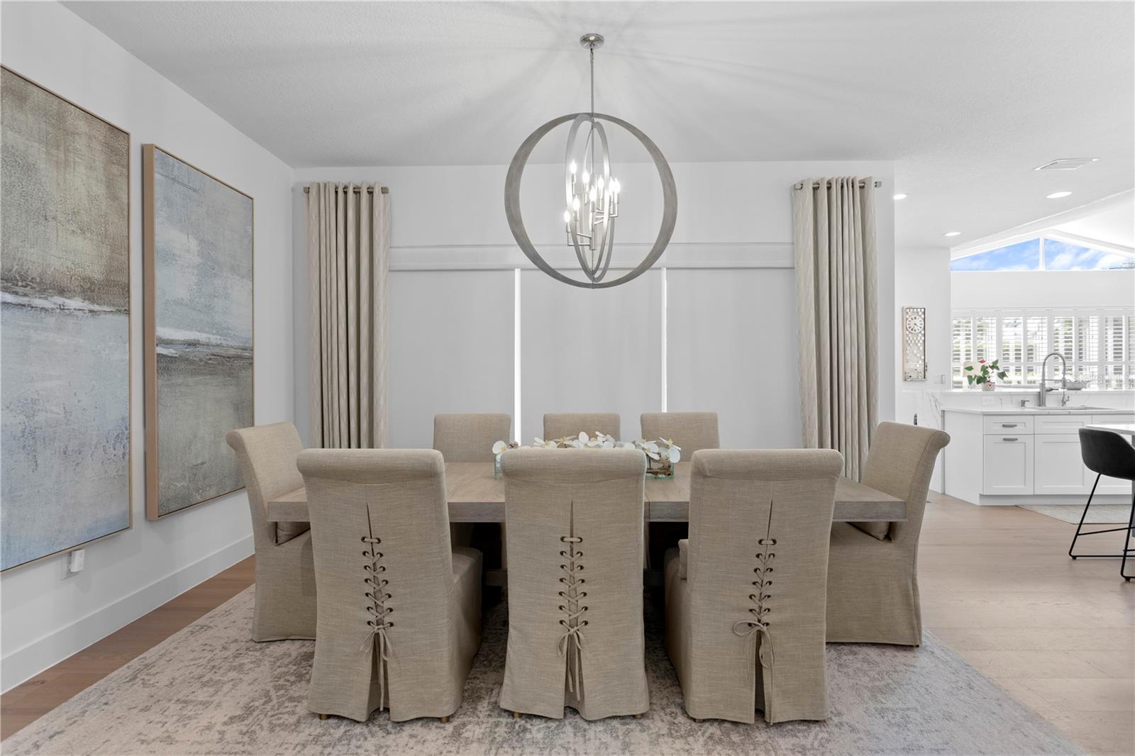 With the touch of a button you can lower the electronic shades in the dining room.