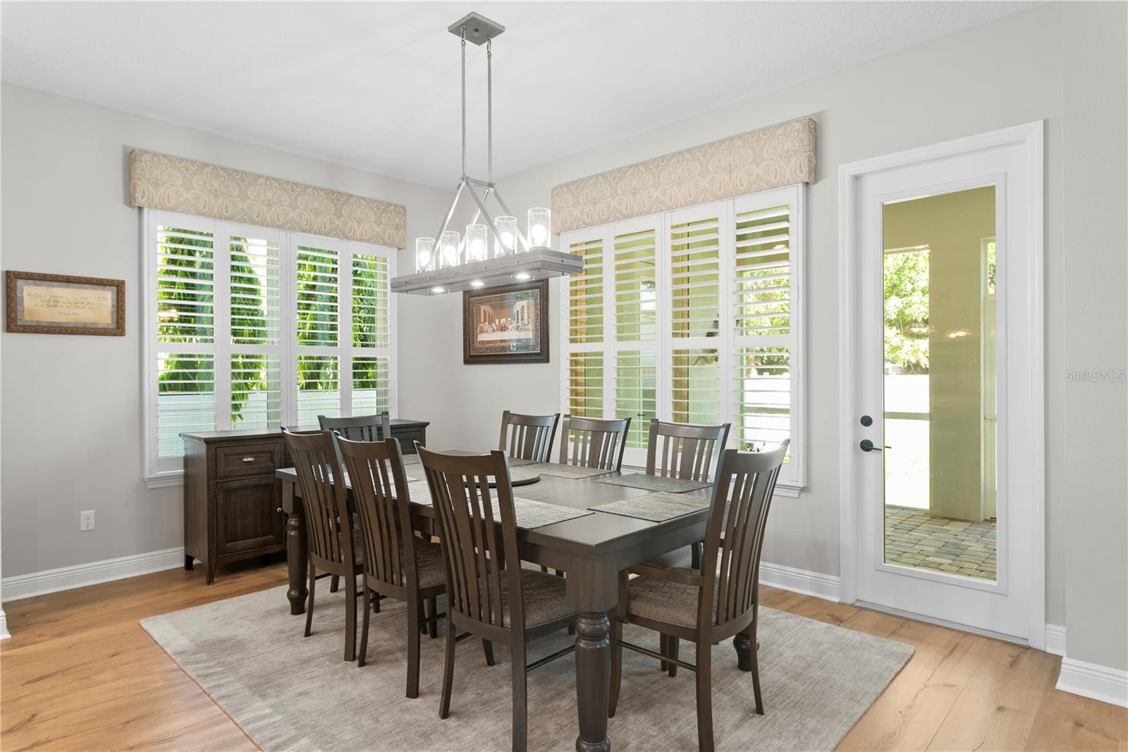This large dining space flows right off the kitchen making it perfect for everyday meals or hosting a crowd.