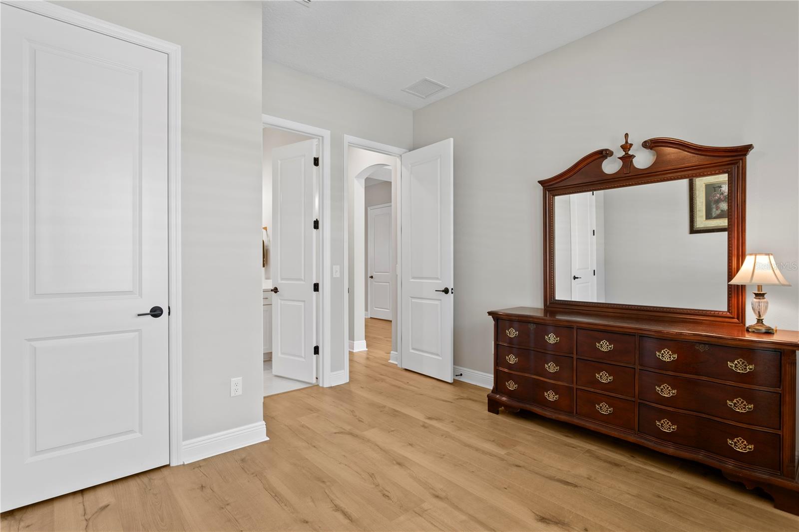 A convenient downstairs bedroom and ensuite bathroom would make a great guest room or home office. Lots of options for this space.